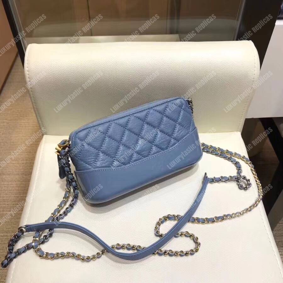 Ch*el clutch with chain baby blue