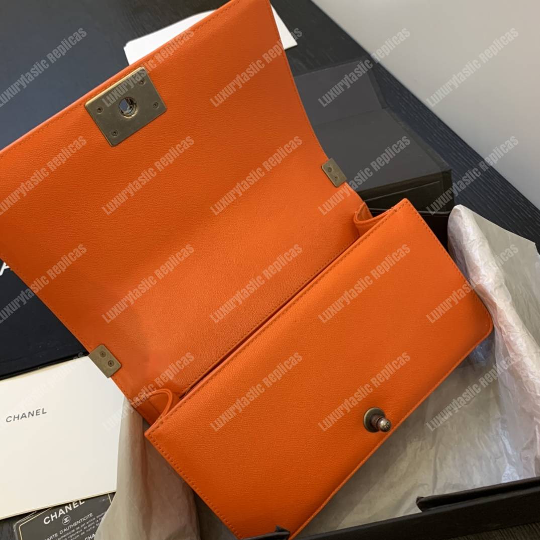 Ch*el boy medium caviar leather orange