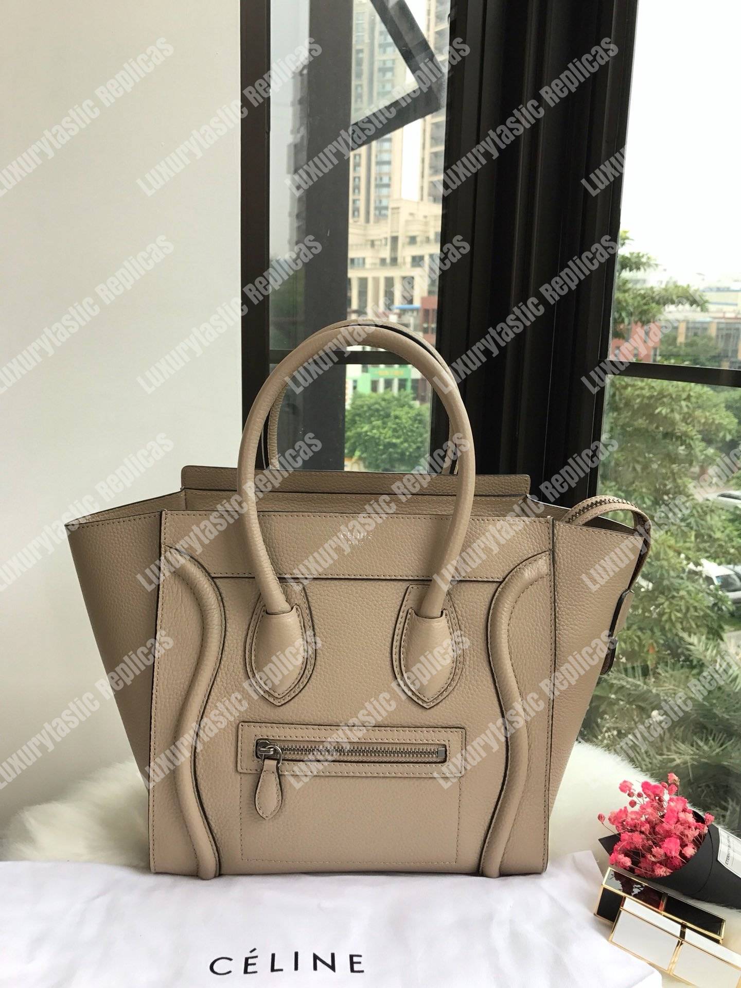 Ce**e micro luggage handbag in drummed calfskin dune