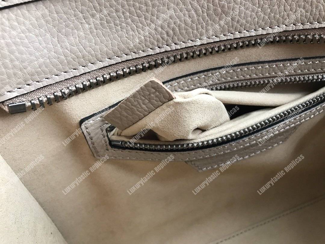 Ce**e micro luggage handbag in drummed calfskin dune