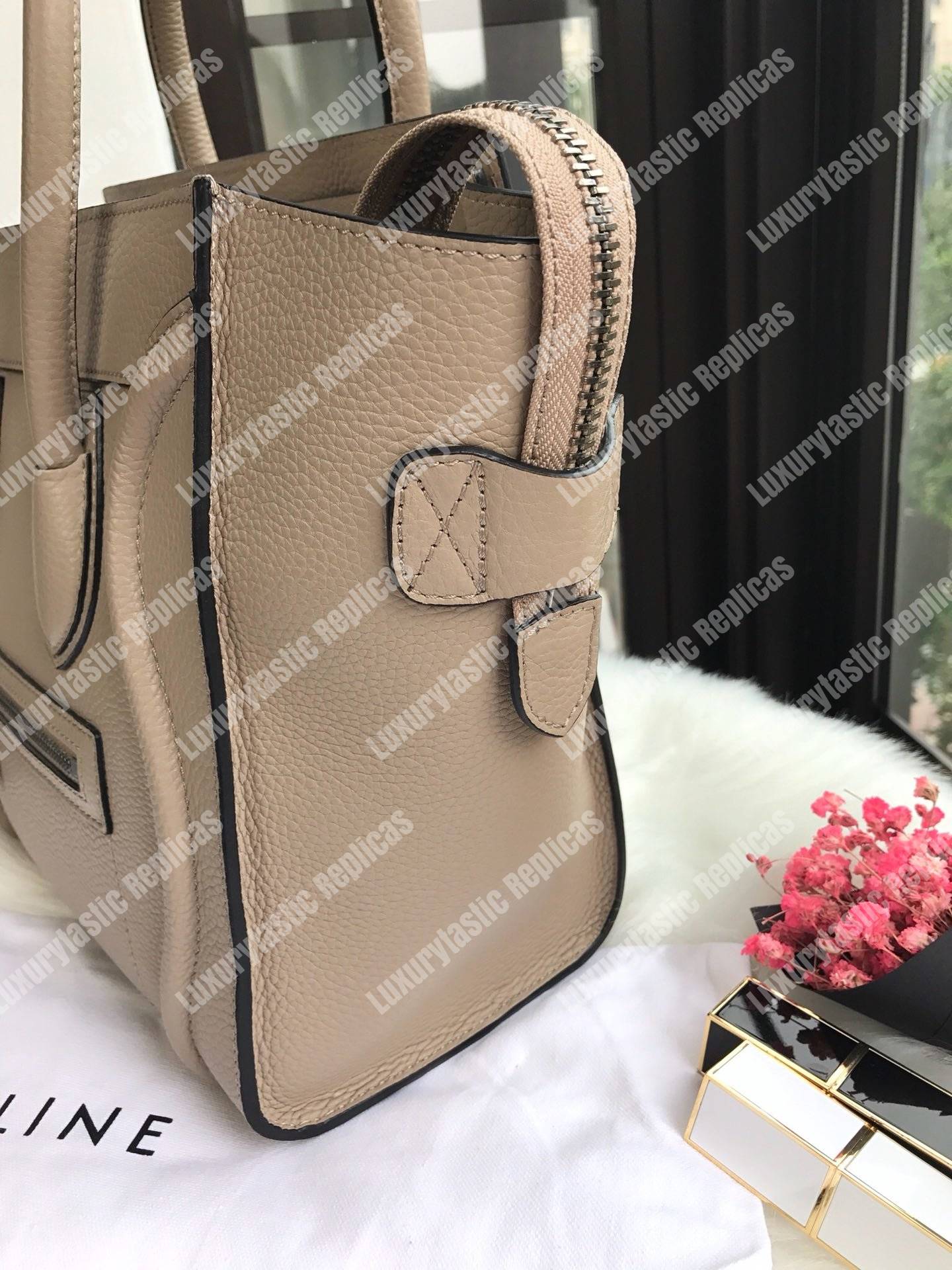 Ce**e micro luggage handbag in drummed calfskin dune
