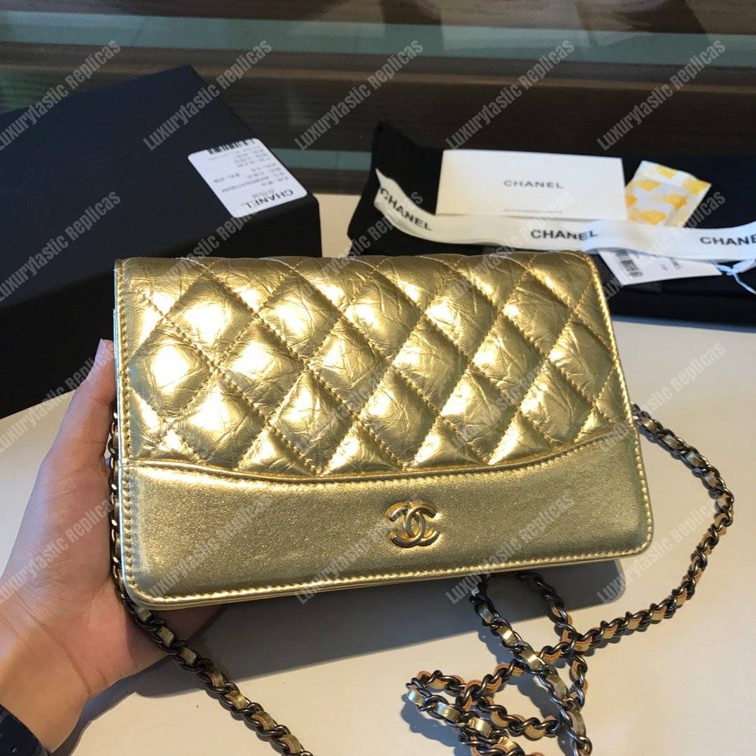 Ch*el wallet on chain – woc aged & smooth calfskin metallic gold