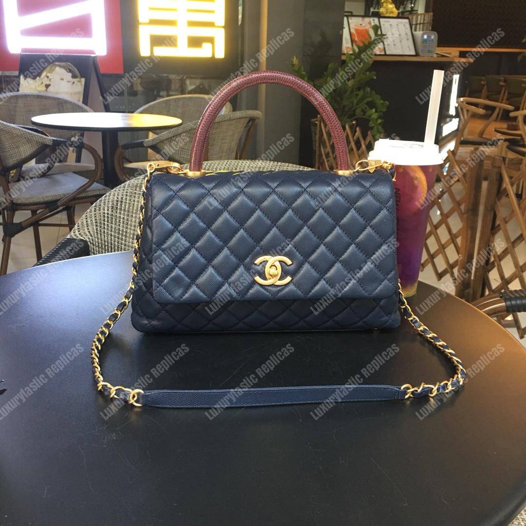 Ch*el flap bag with top handle navy blue