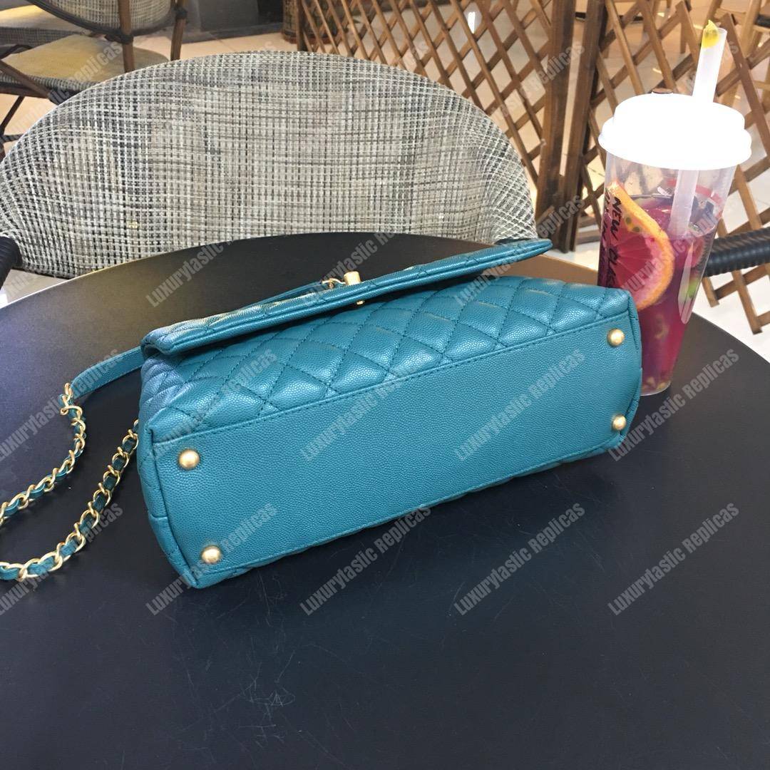 Ch*el flap bag with top handle blue