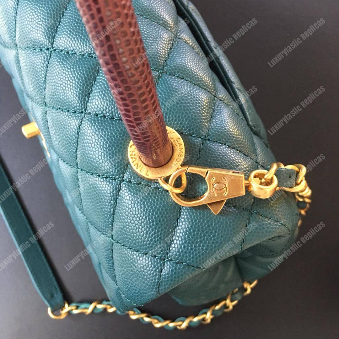 Ch*el flap bag with top handle blue