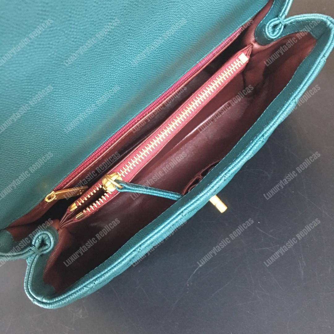 Ch*el flap bag with top handle blue