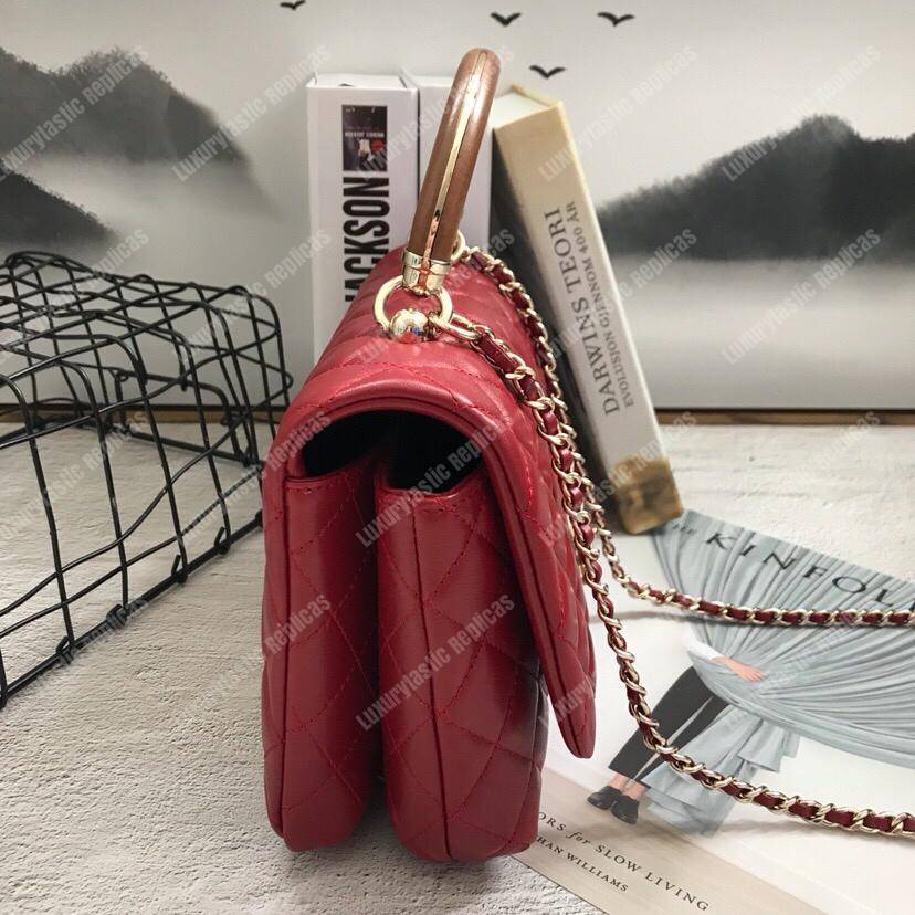 Ch*el flap bag with top handle red