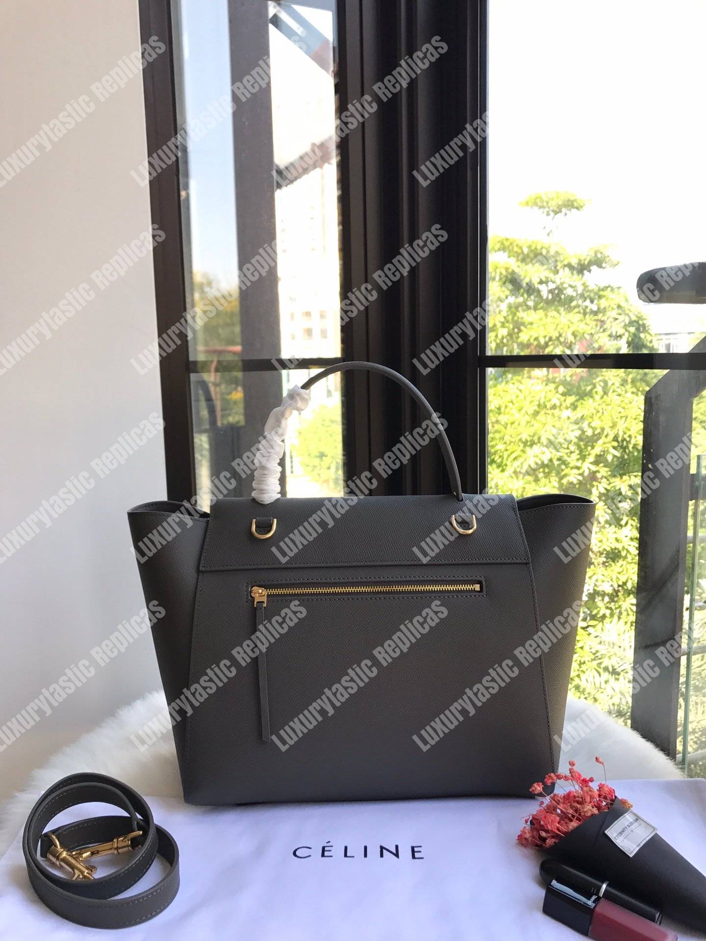 Ce**e mini belt bag in grained calfskin grey