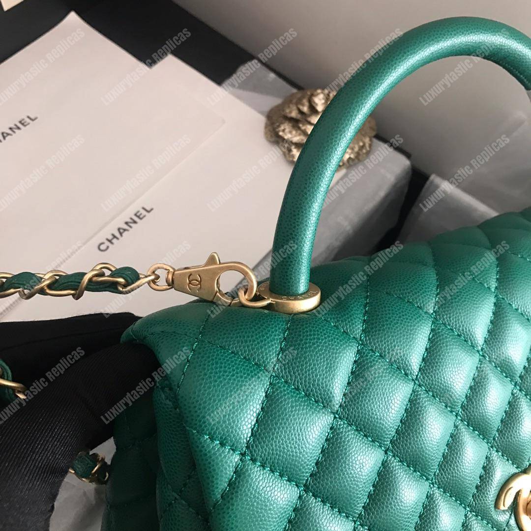 Ch*el flap bag with top handle green