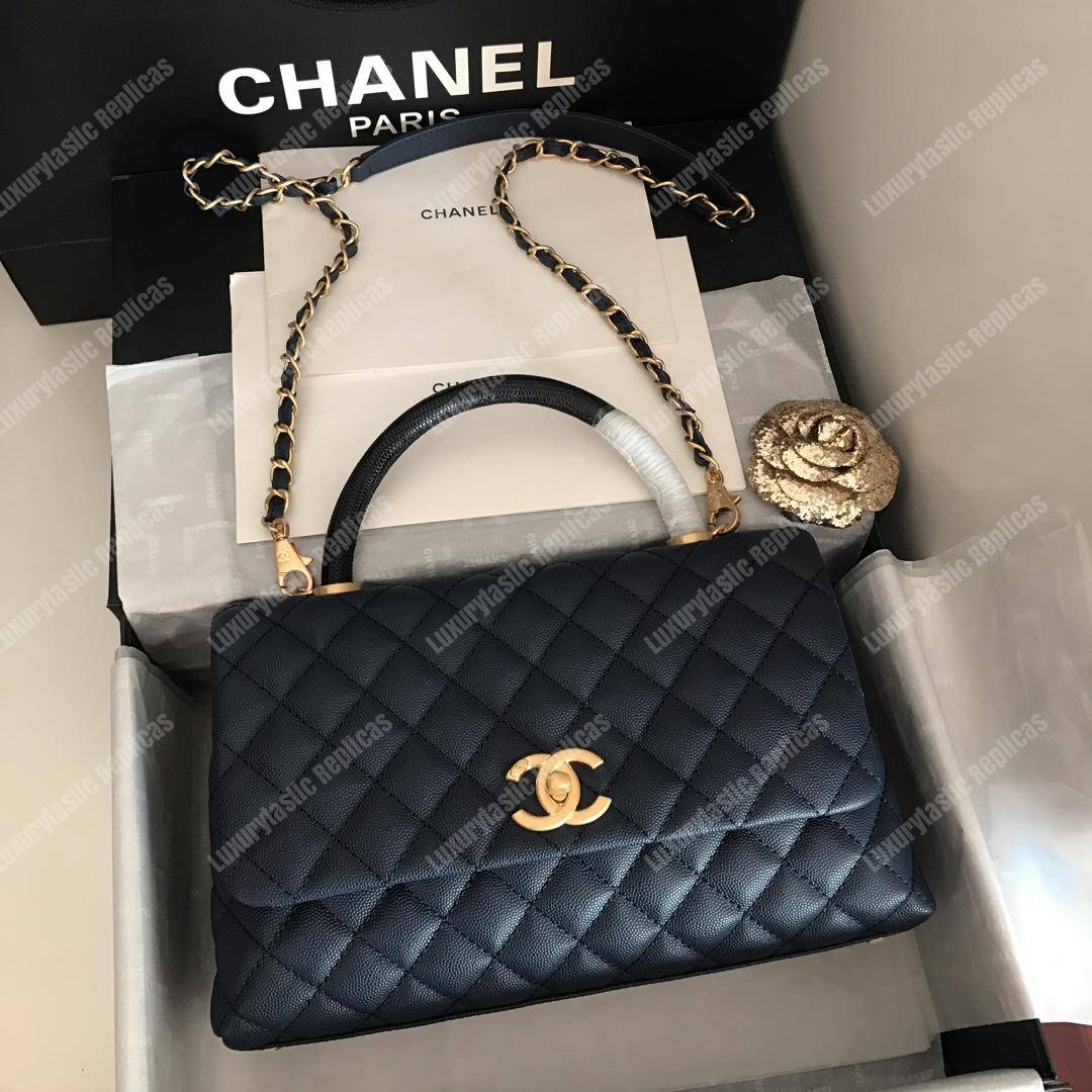 Ch*el flap bag with top handle navy blue
