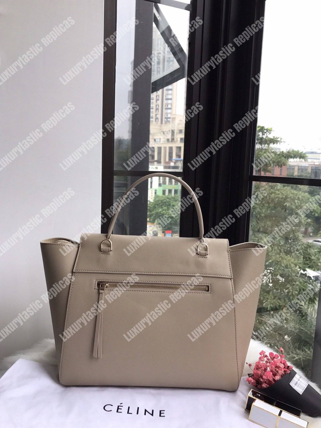 Ce**e mini belt bag in grained calfskin light taupe