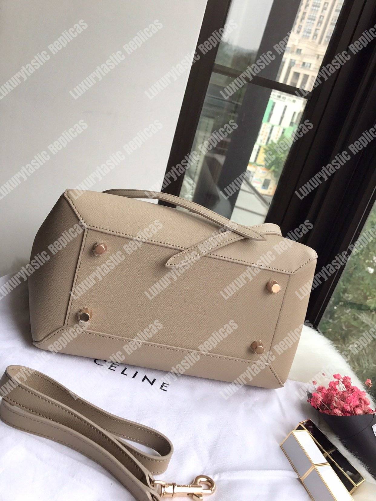 Ce**e mini belt bag in grained calfskin light taupe