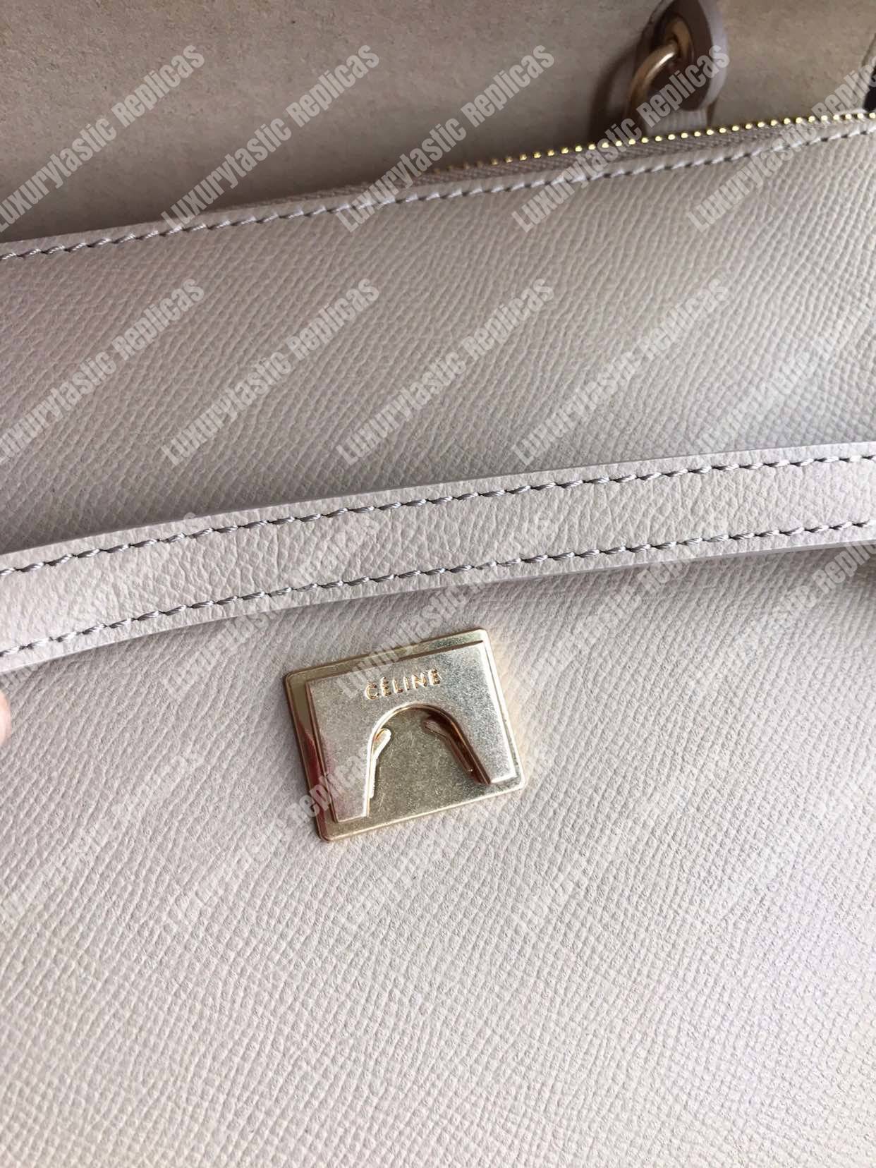 Ce**e mini belt bag in grained calfskin light taupe
