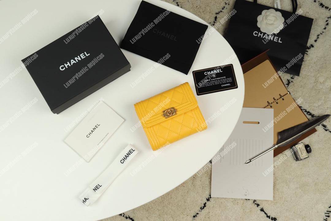 Ch*el boy small flap wallet yellow