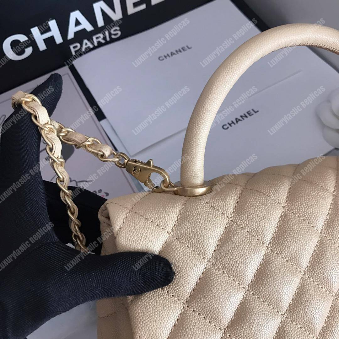 Ch*el flap bag with top handle beige