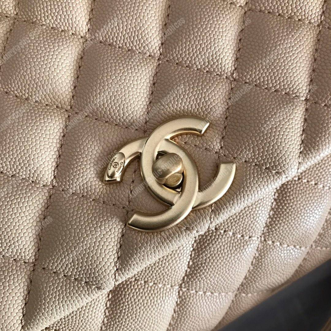 Ch*el flap bag with top handle beige