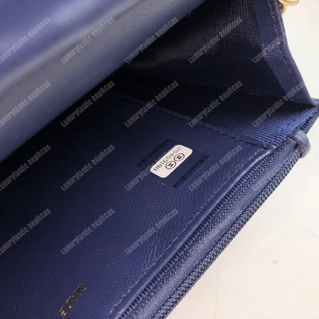 Ch*el wallet on chain – woc chevron lambskin dark blue gold-toned