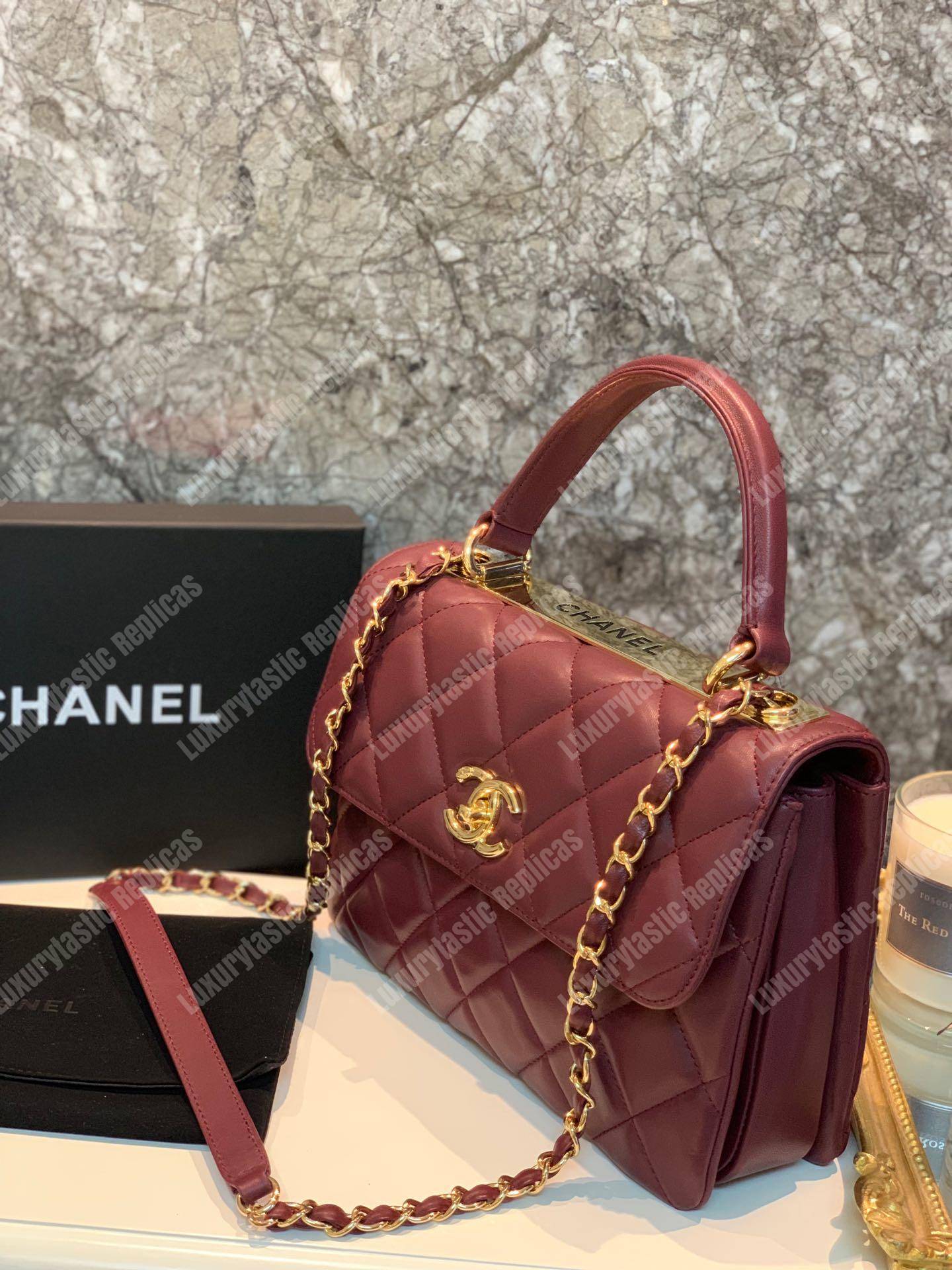 Ch*el small flap bag with top handle burgundy-gold