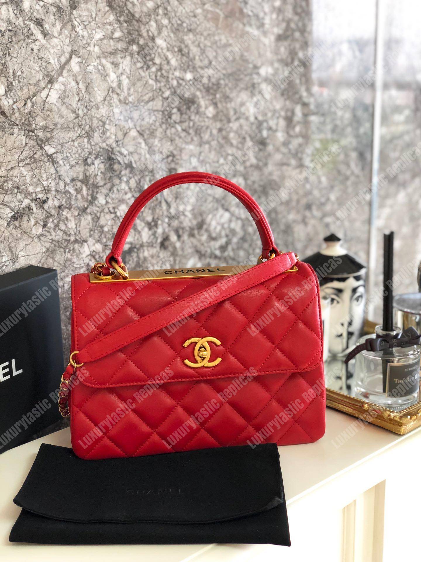 Ch*el small flap bag with top handle red-gold