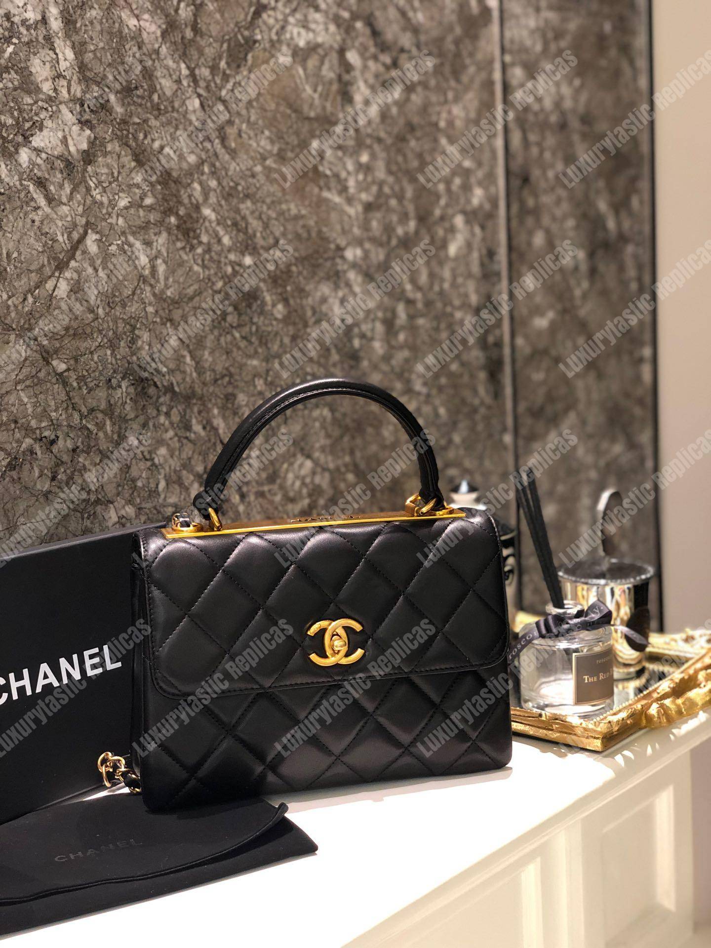 Ch*el small flap bag with top handle black-gold