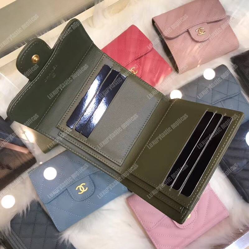 Ch*el classic small flap wallet dark green