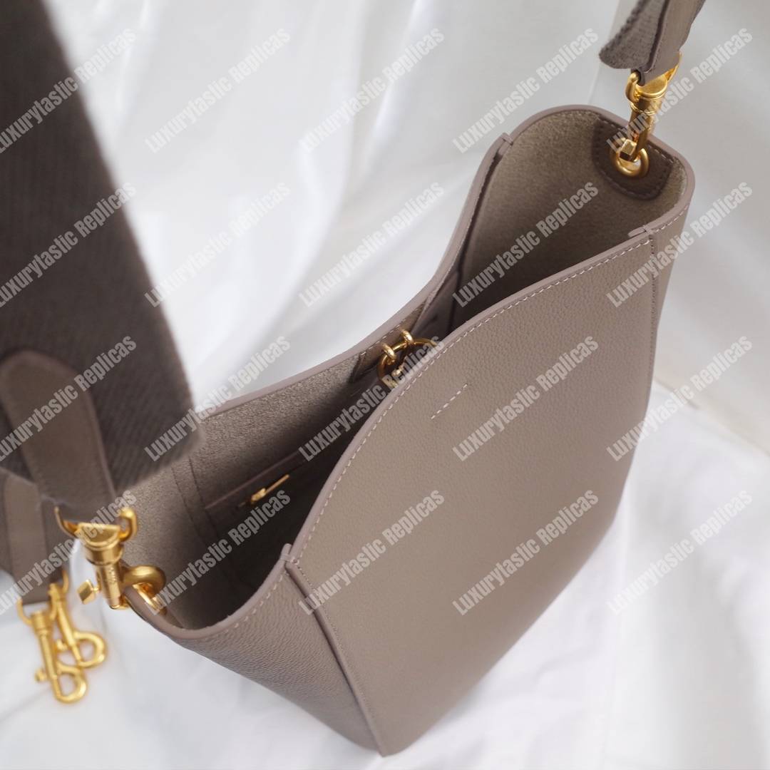 Ce**e sangle small bucket bag in soft grained calfskin taupe