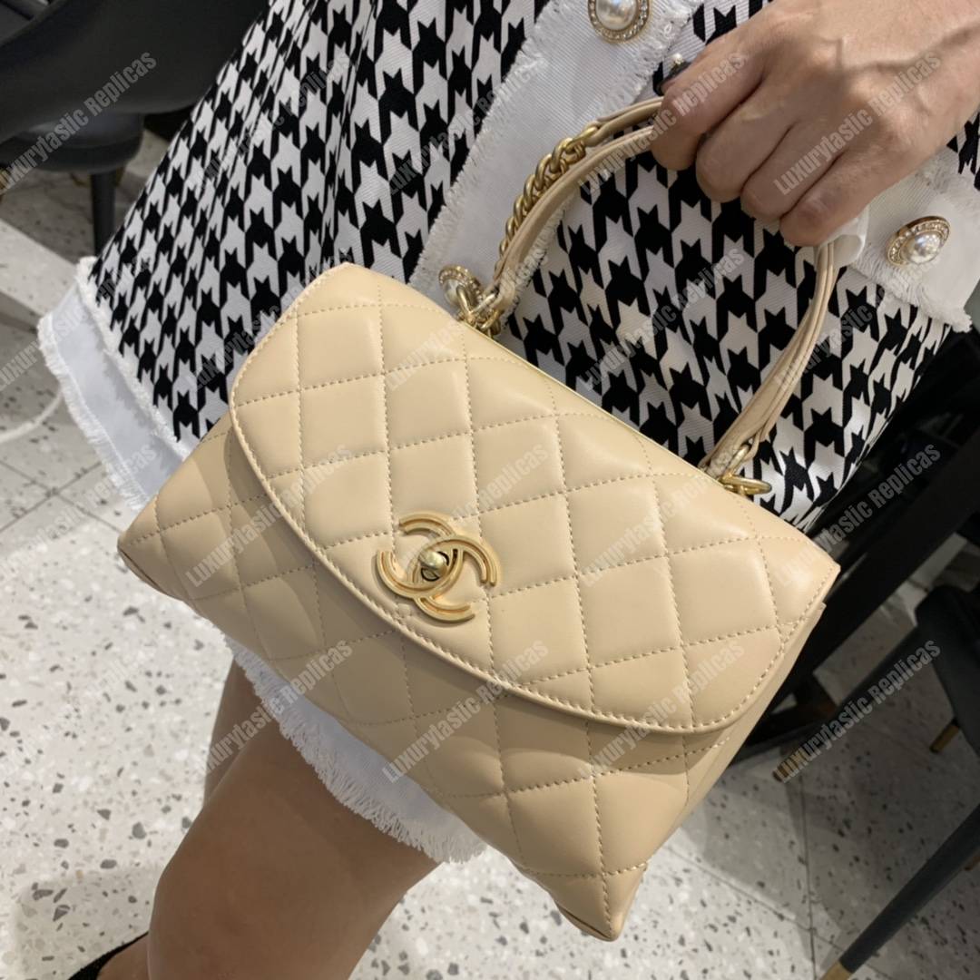 Ch*el flap bag with top handle lambskin beige