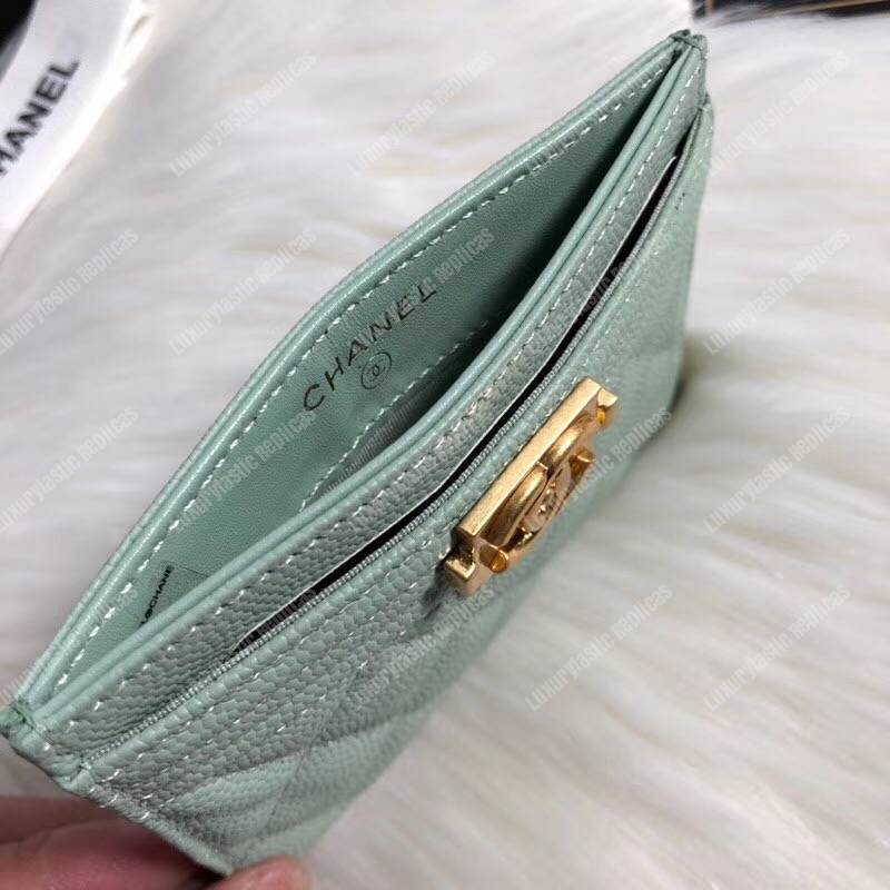 Ch*el boy card holder light green