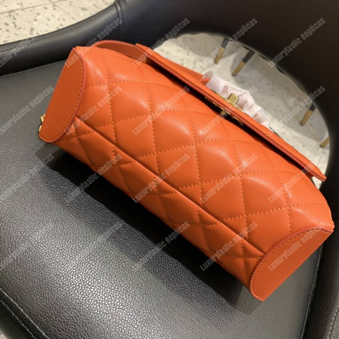 Ch*el flap bag with top handle lambskin orange