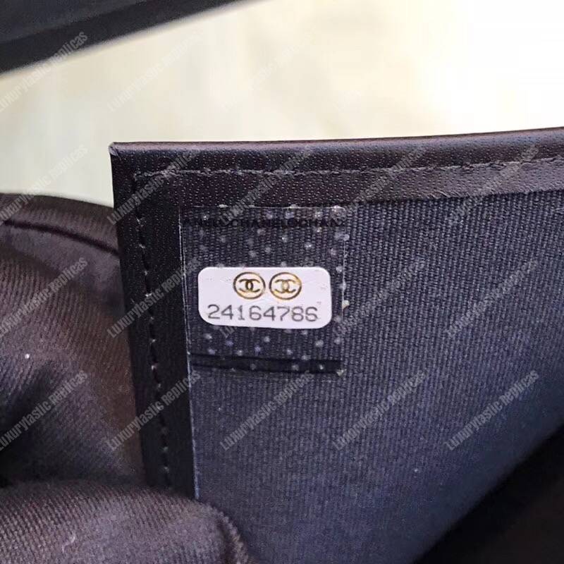 Ch*el boy small flap wallet black