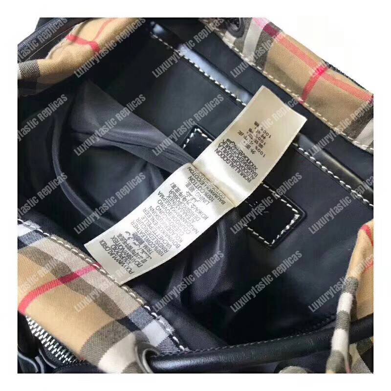 B**rry the small rucksack in vintage checkers