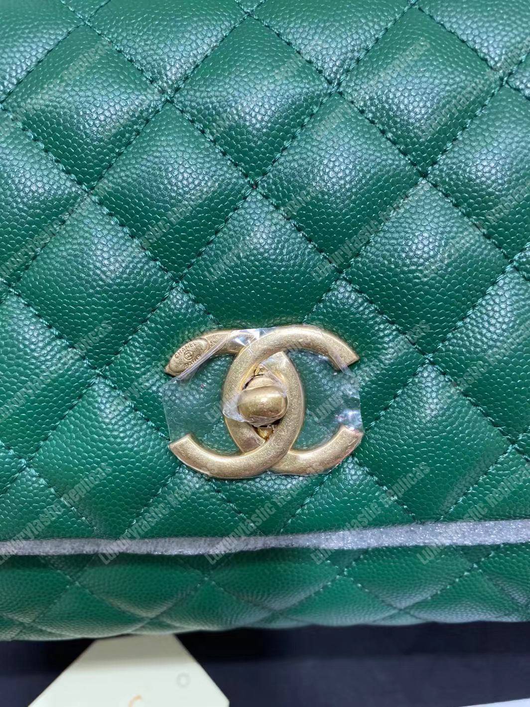 Ch*el flap bag with top handle green