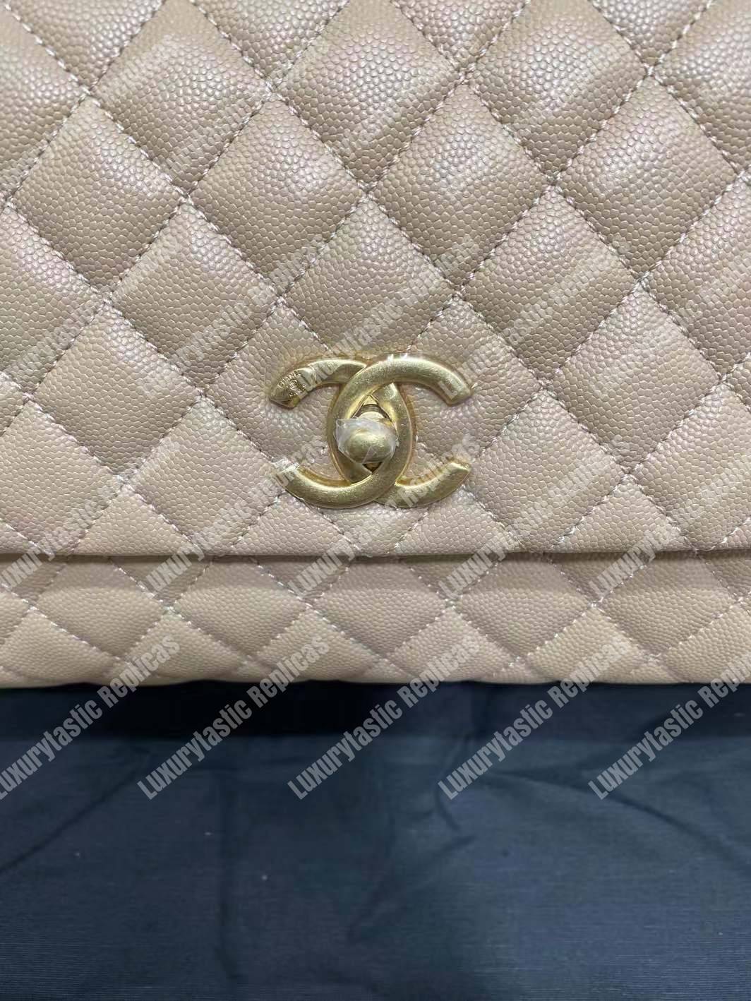 Ch*el flap bag with top handle beige