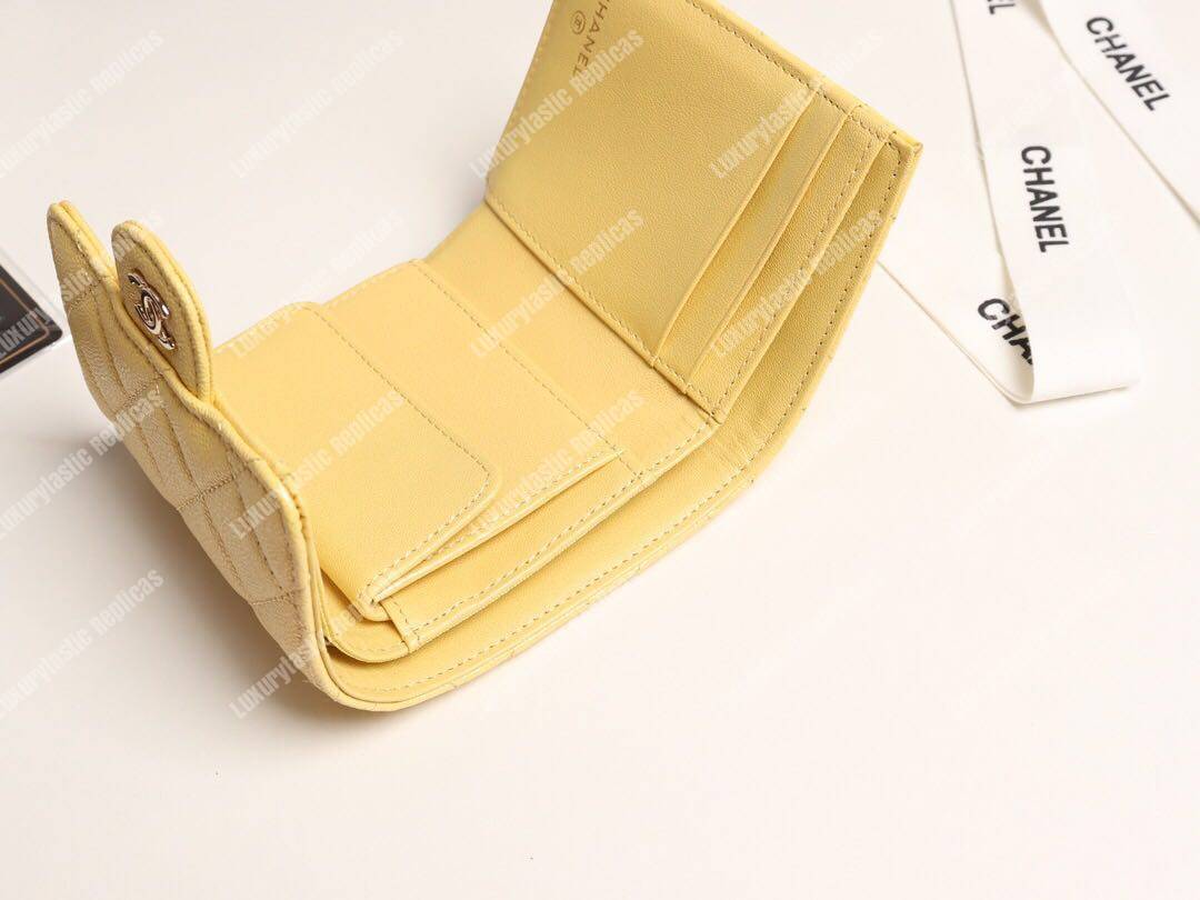 Ch*el classic small flap wallet yellow