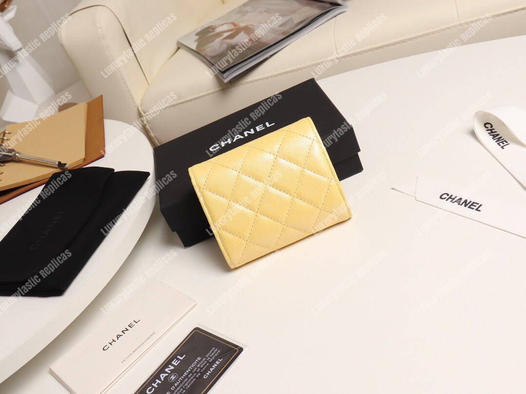 Ch*el classic small flap wallet yellow