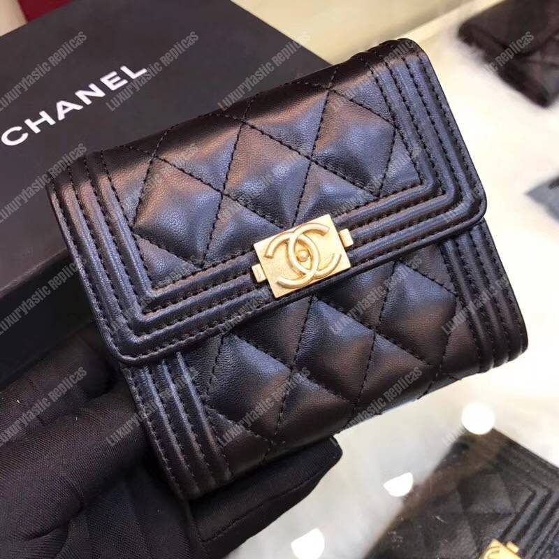 Ch*el boy small flap wallet black