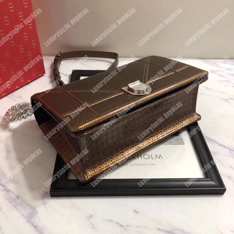 D*orama dark gold-toned metallic calfskin flap bag