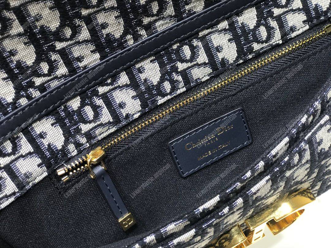 30 Montaigne Jacquard Canvas Clutch Bag Blue