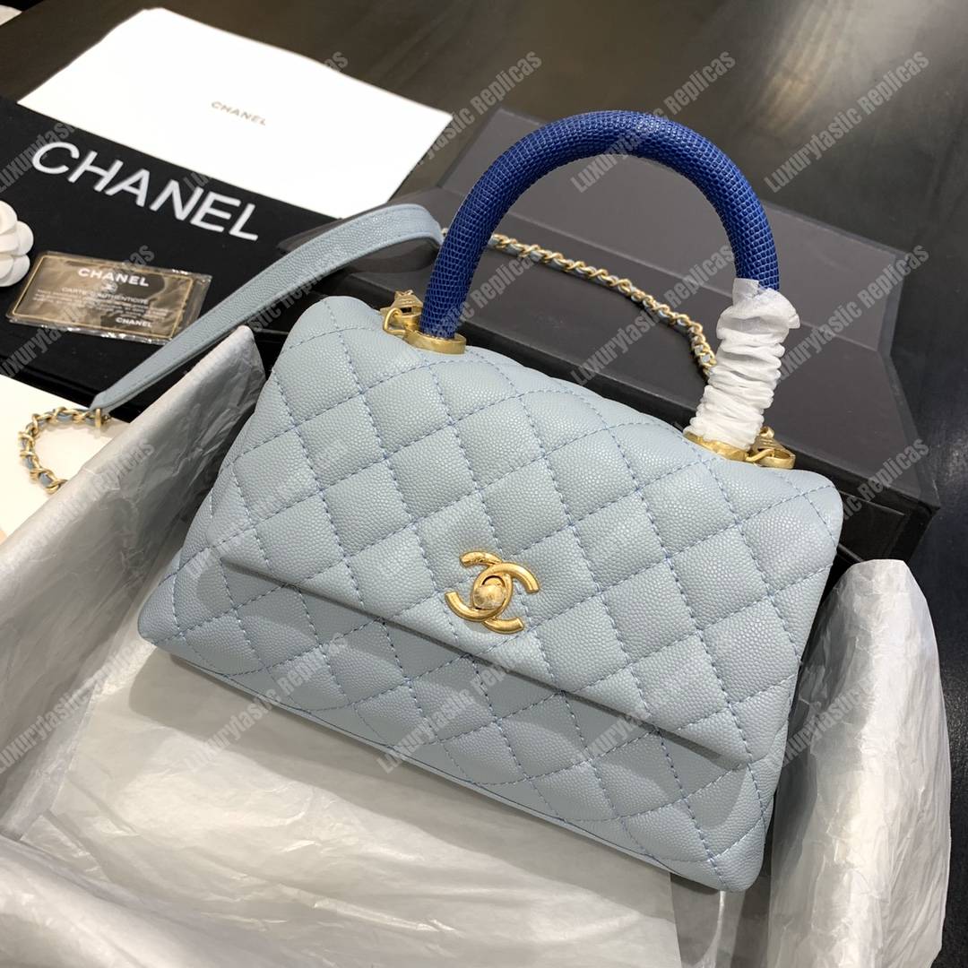 Ch*el flap bag with top handle caviar leather sky blue