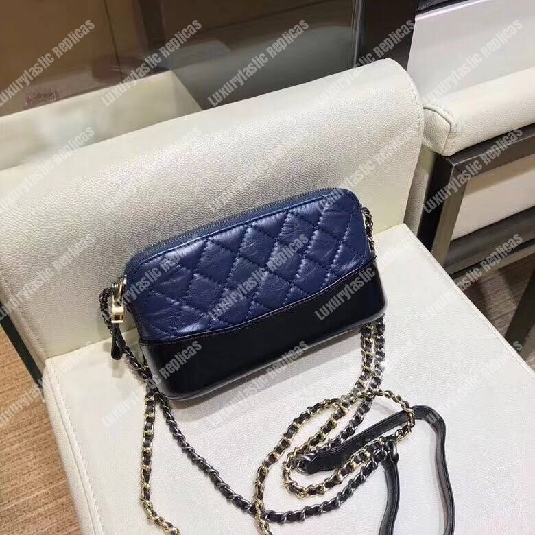 Ch*el clutch with chain blue and black
