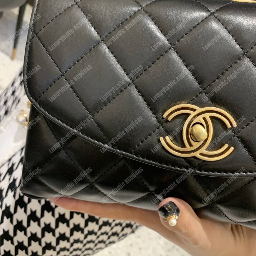 Ch*el flap bag with top handle lambskin black