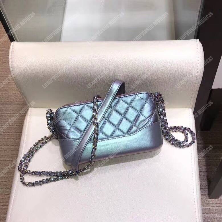 Ch*el clutch with chain purple metallic