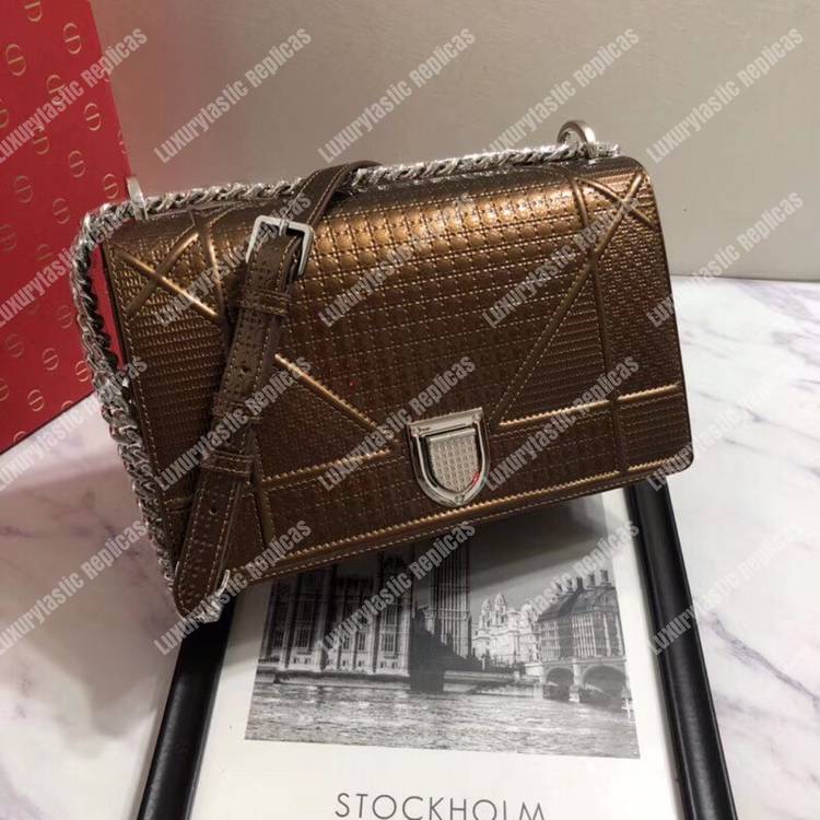 D*orama dark gold-toned metallic calfskin flap bag