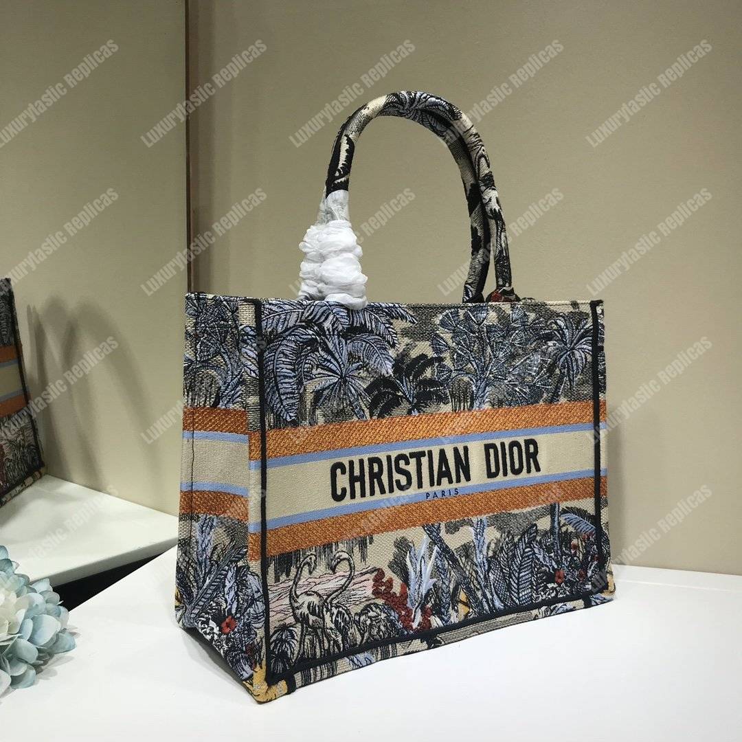 mini D*or book tote bag in embroidered canvas blue toile de jouy tropicalia