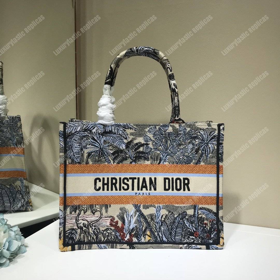 mini D*or book tote bag in embroidered canvas blue toile de jouy tropicalia