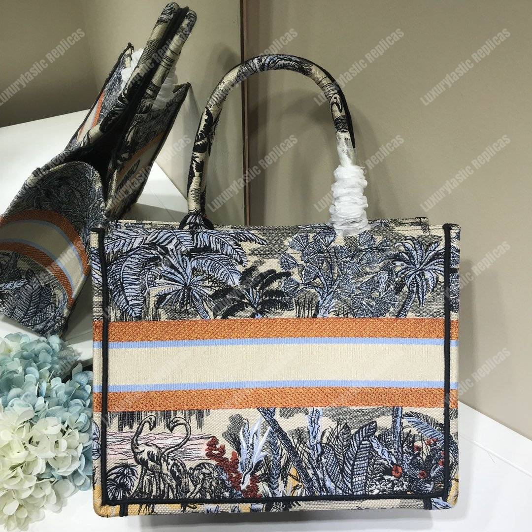mini D*or book tote bag in embroidered canvas blue toile de jouy tropicalia