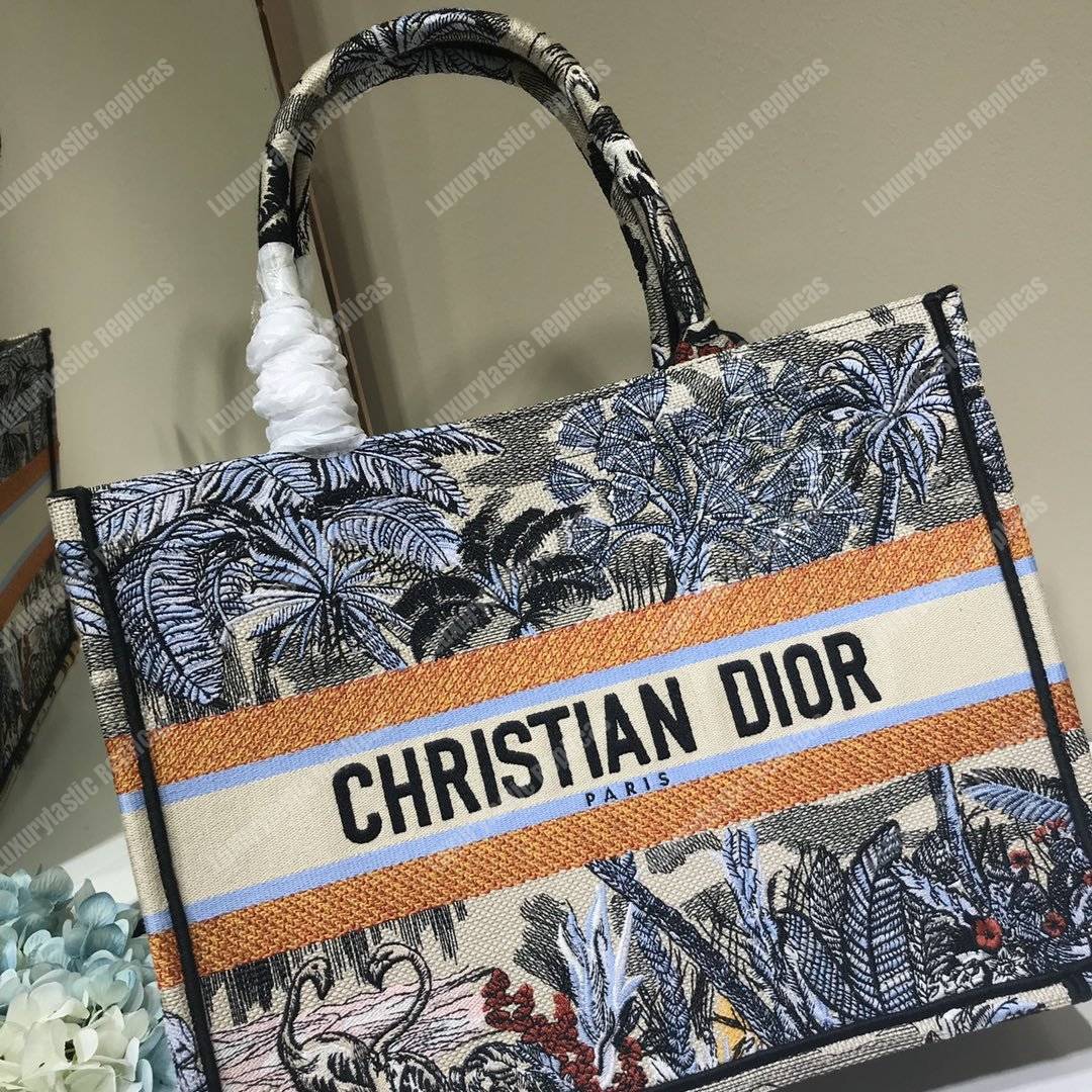mini D*or book tote bag in embroidered canvas blue toile de jouy tropicalia