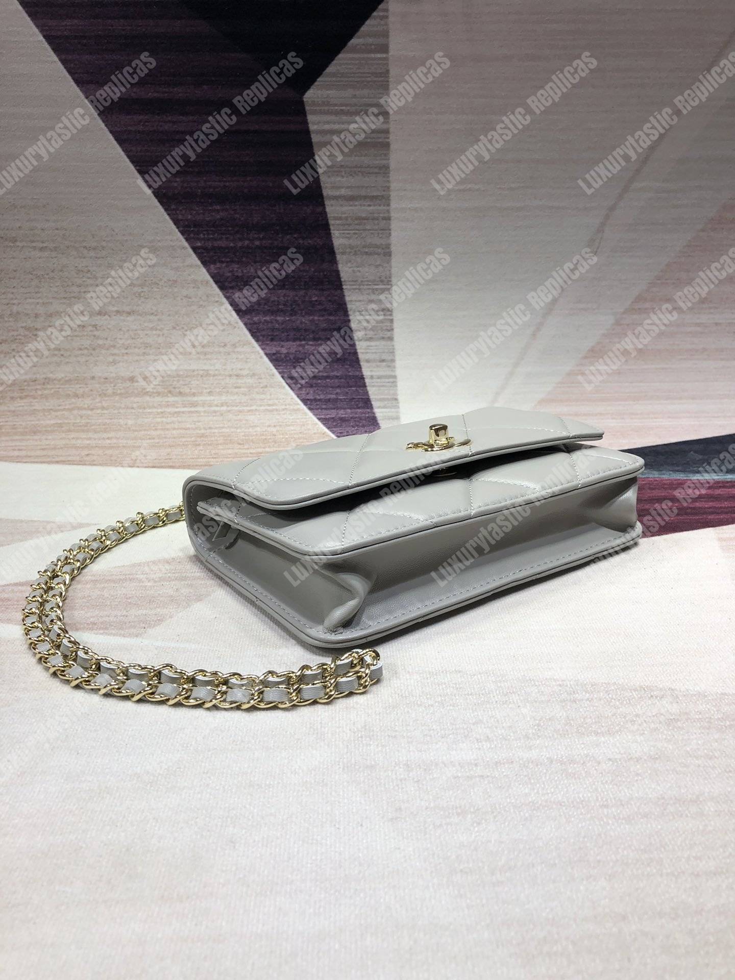 Ch*el wallet on chain – woc lambskin gold-toned metal white