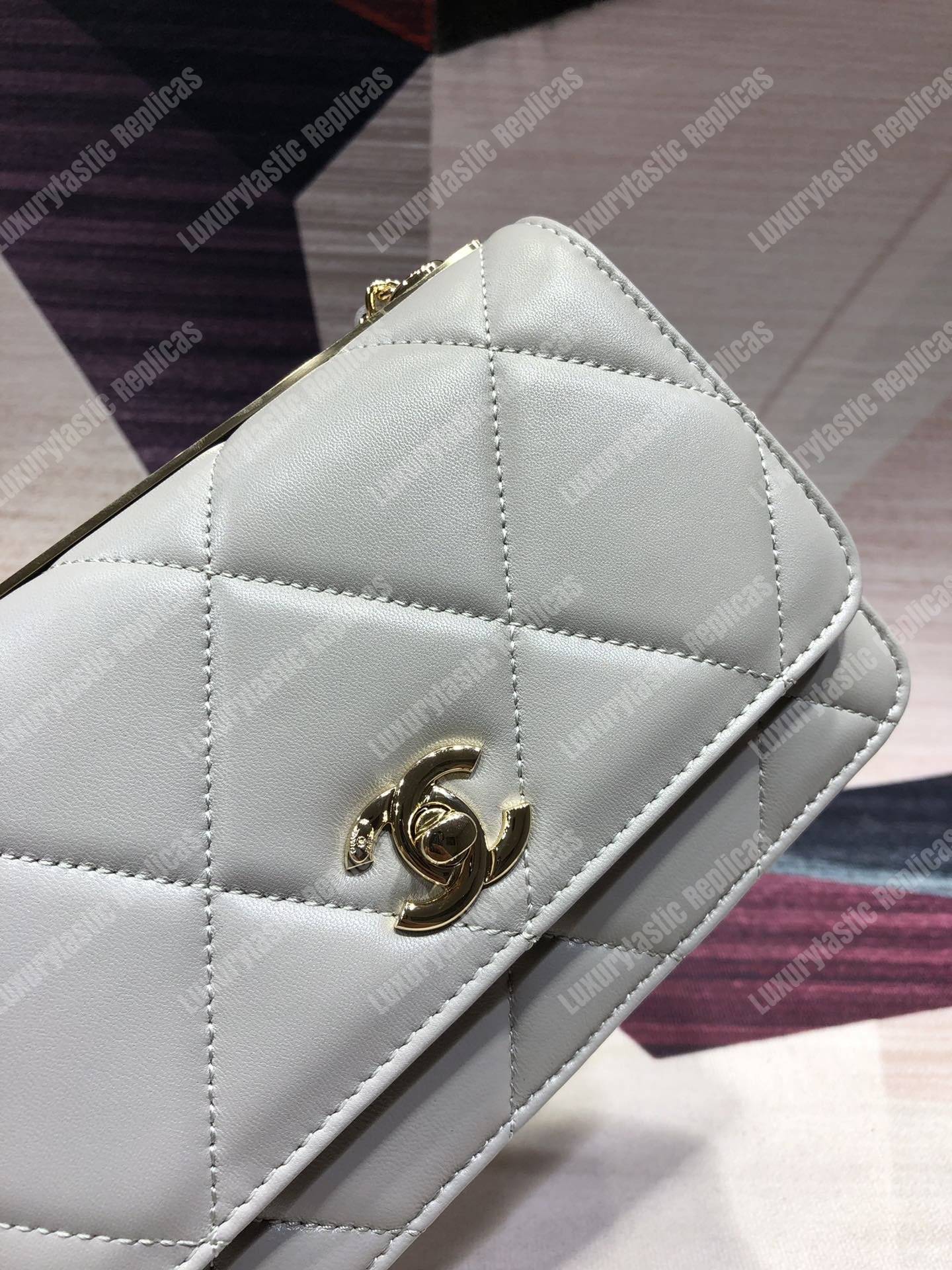 Ch*el wallet on chain – woc lambskin gold-toned metal white
