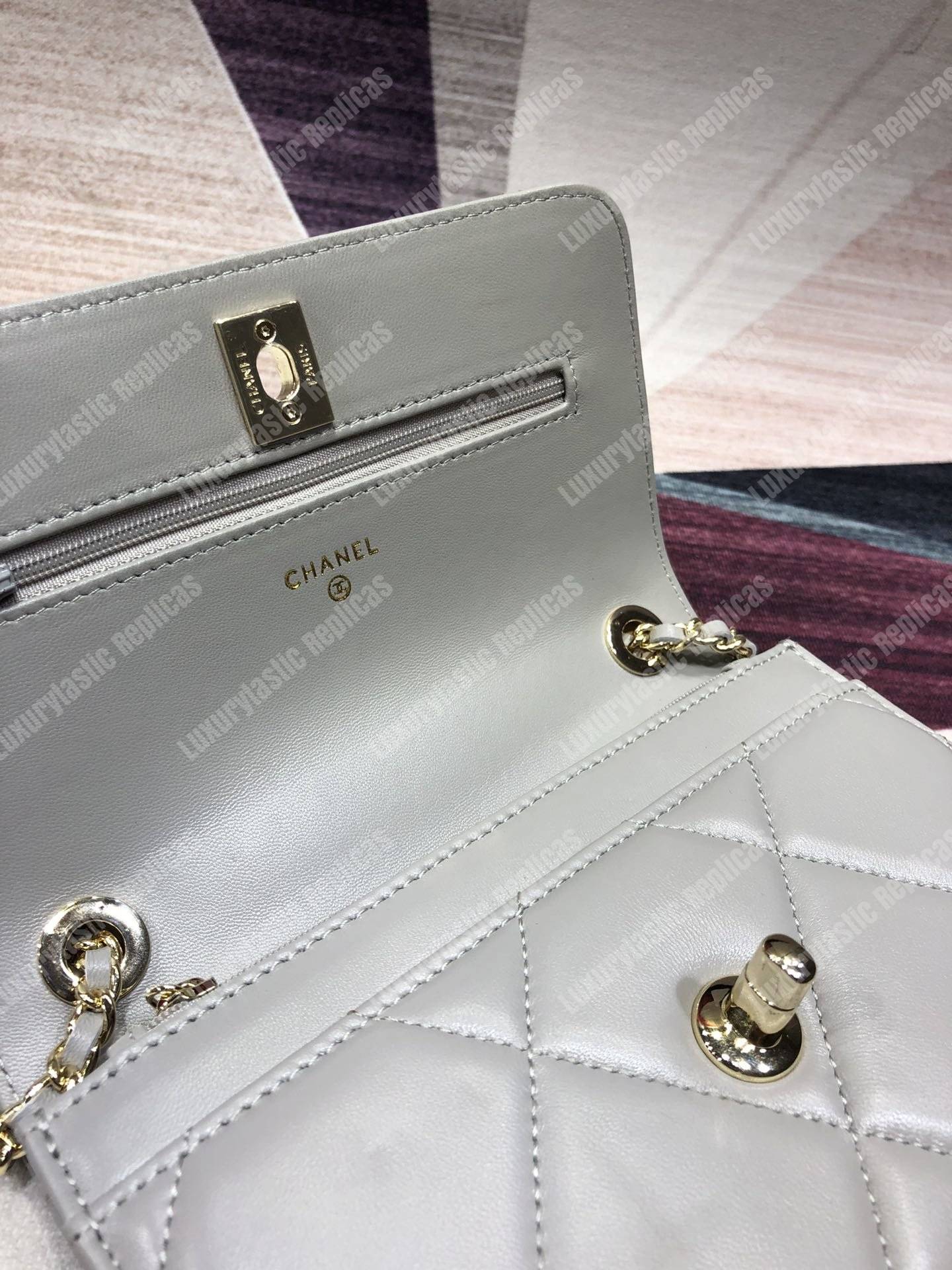 Ch*el wallet on chain – woc lambskin gold-toned metal white